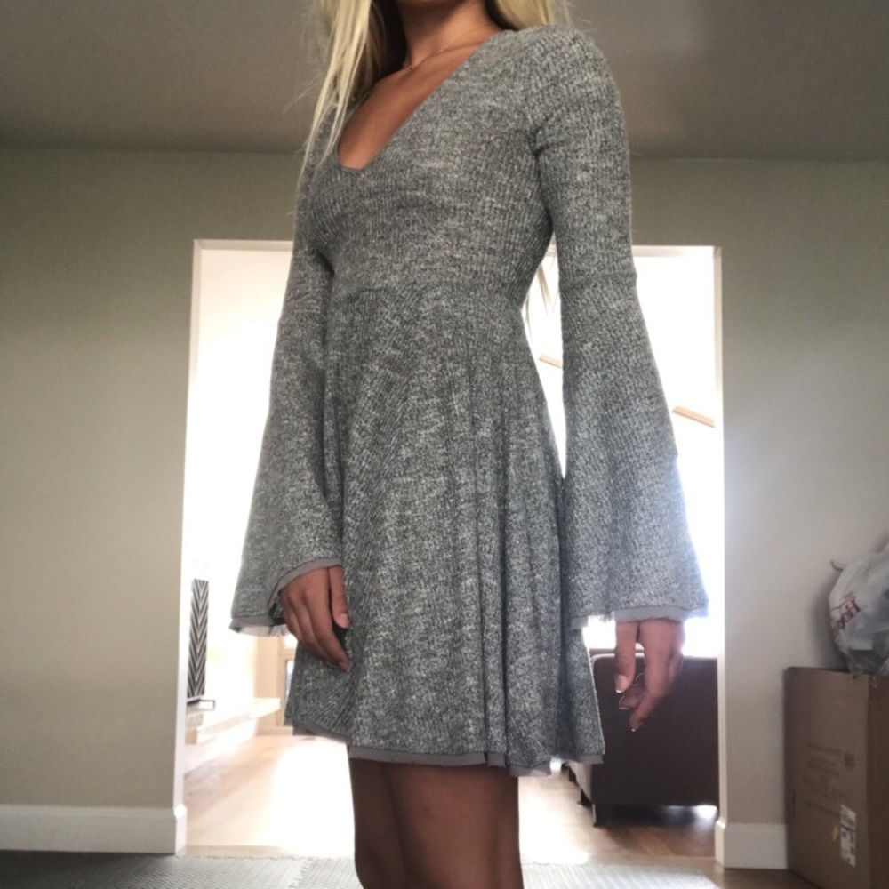 RARE knitted dress with flared sleeves and bottom